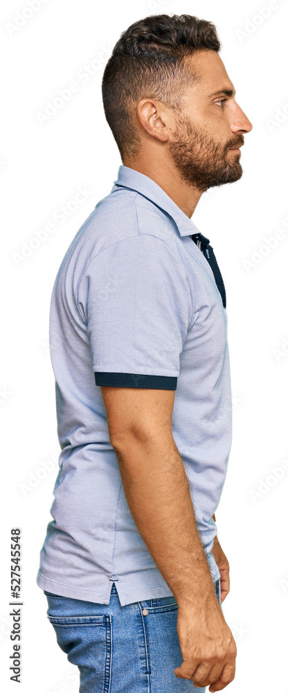 Handsome man with beard wearing casual clothes looking to side, relax profile pose with natural face and confident smile. Handsome man with beard wearing casual clothes looking to side, relax profile pose with natural face and confident smile.