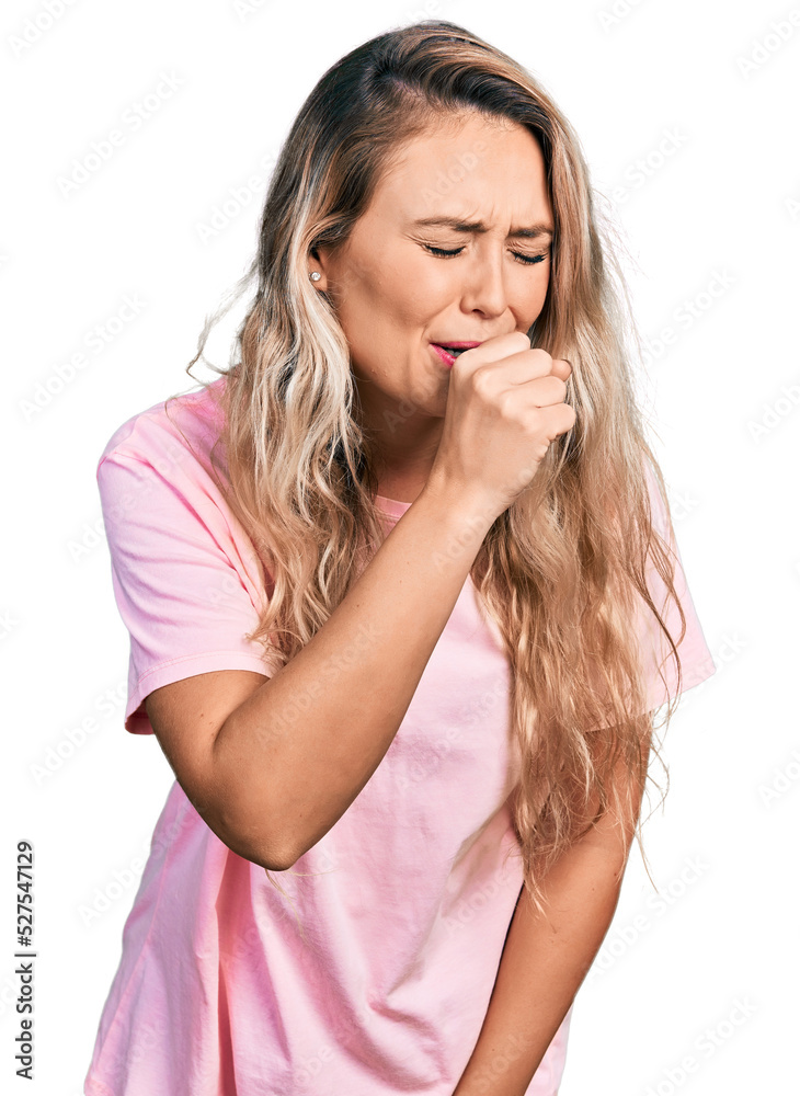Young blonde woman wearing casual pink t shirt feeling unwell and coughing as symptom for cold or bronchitis. health care concept. Young blonde woman wearing casual pink t shirt feeling unwell and coughing as symptom for cold or bronchitis. health care concept.