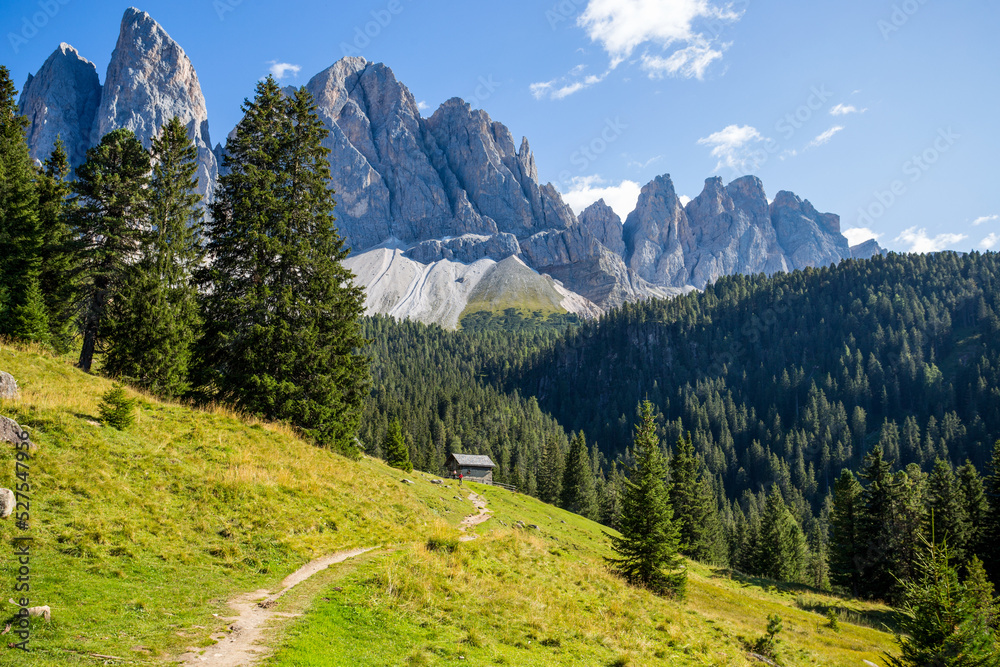 View of the path towards The Odle group (Geislergruppe) in the Dolomitics alps, South Tyrol, Italy.