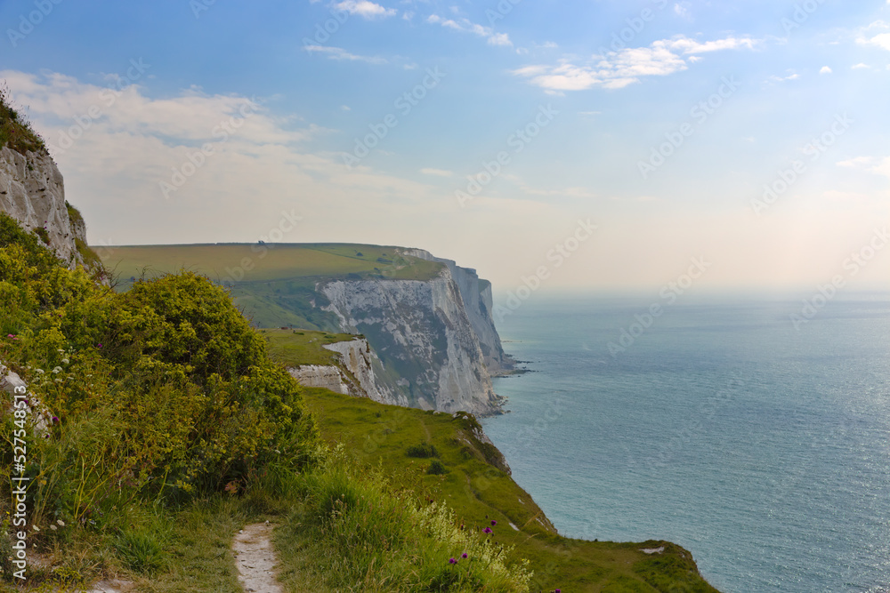 Landscape photo of White Cliffs of Dover taken from National Trust park in Southern England