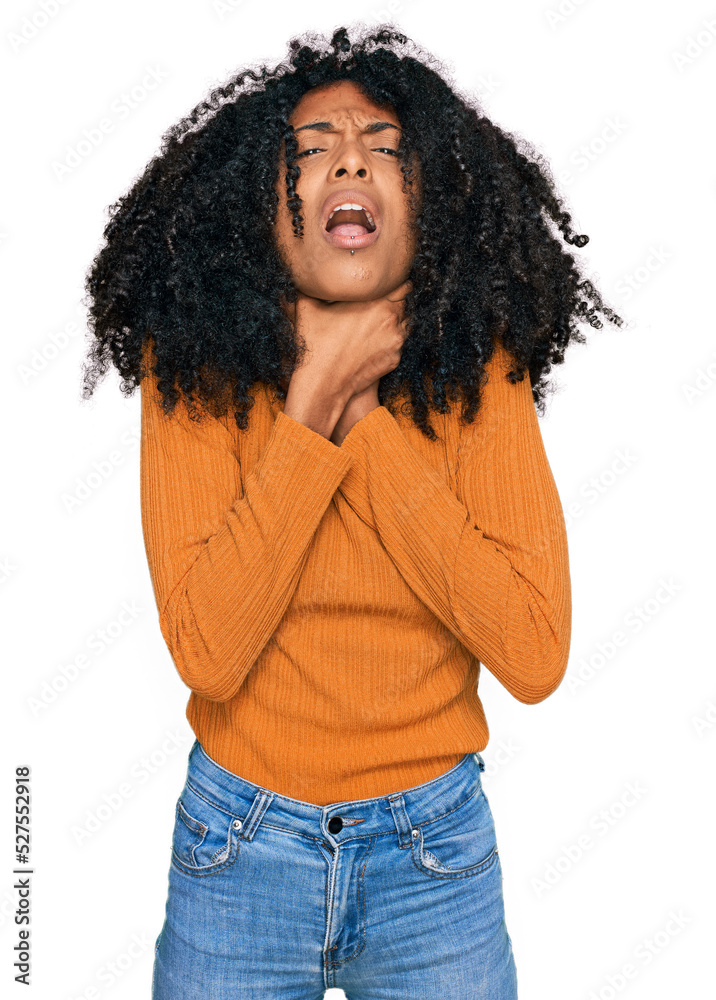 Young african american girl wearing casual clothes shouting and suffocate because painful strangle. health problem. asphyxiate and suicide concept.