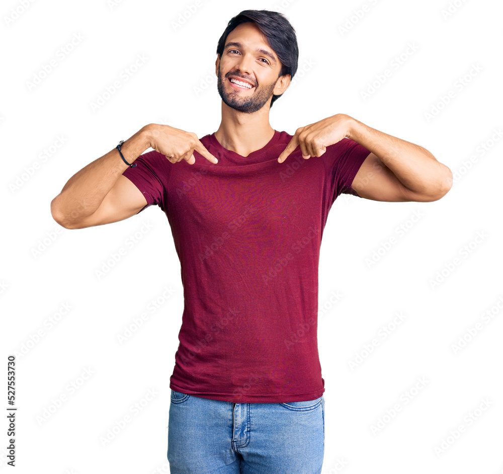 Handsome hispanic man wearing casual clothes looking confident with smile on face, pointing oneself with fingers proud and happy. Handsome hispanic man wearing casual clothes looking confident with smile on face, pointing oneself with fingers proud and happy.