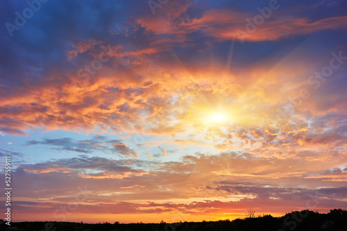 Sunset sky, clouds painted in bright colors over Kyiv