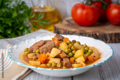 Turkish Food Green Pea Stew with Meatballs - Kofte or Kofta Bezelye. (Turkish name; kofteli bezelye)