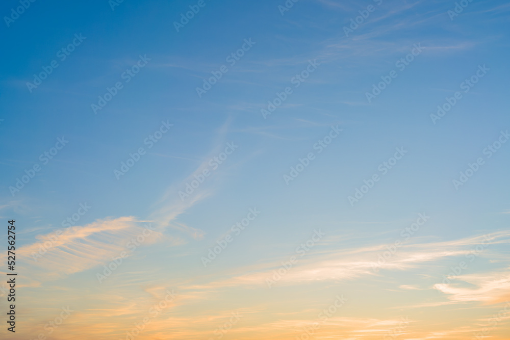 Fototapeta premium Evening cloudy sky with the setting sun