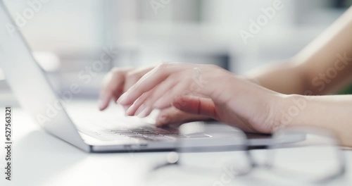 Hands, laptop and keyboard in timelapse or fast forward with a business woman working in the office at work. Female employee in a rush to complete a project in time for a deadline in the workplace photo