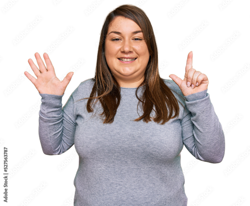Beautiful brunette plus size woman wearing casual clothes showing and pointing up with fingers number seven while smiling confident and happy. Beautiful brunette plus size woman wearing casual clothes showing and pointing up with fingers number seven while smiling confident and happy.