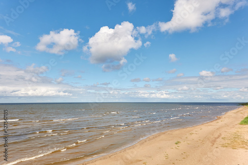 Panoramic view of the Baltic sea from a sandy shore on a sunny summer day. Clouds. Kabli beach, Estonia. Nature, eco tourism, wanderlust, vacation concepts © Aastels