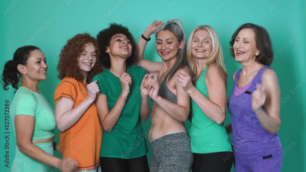 Group of different kind of women with different body, age, and ethnicity making sport Group of different kind of women with different body, age, and ethnicity making sport