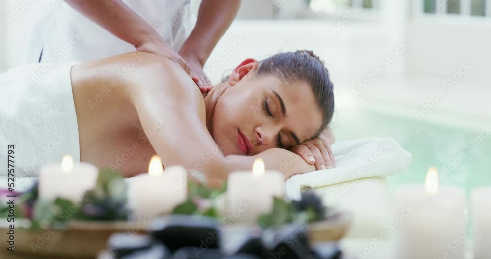 Relax, spa and luxury body massage treatment at a wellness, health and beauty salon. Woman with a calm, healthy and selfcare lifestyle getting body care and natural back therapy at a cosmetic salon.