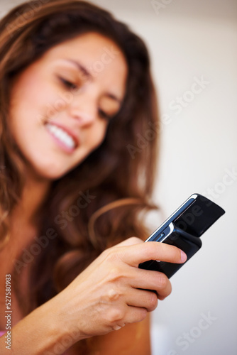 Phone internet, social media and web search of a woman with a happy smile texting. Mobile network communication, reading and typing a online message, email or text having a cyber conversation