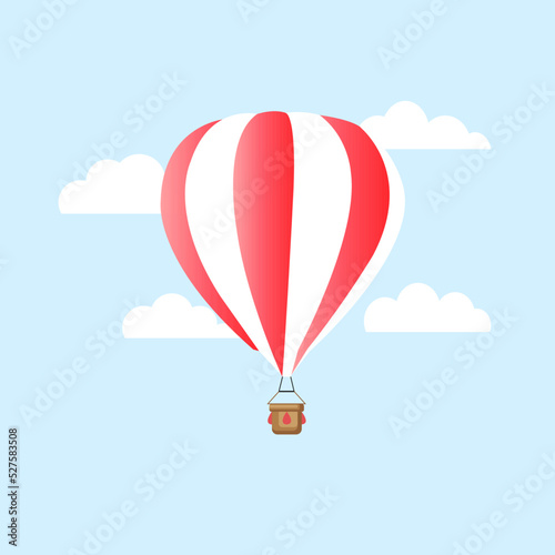 red hot air balloon and flying in the sky with clouds