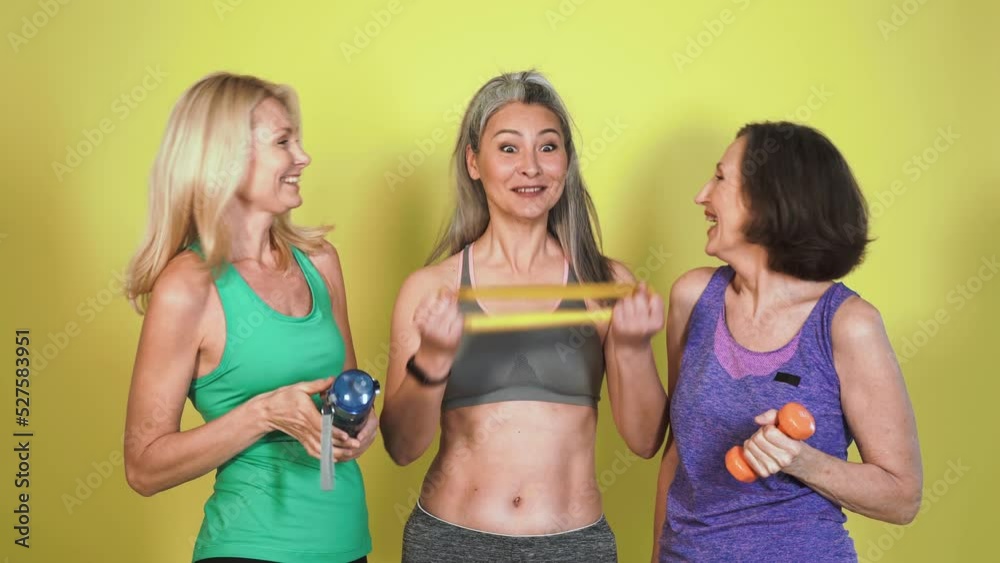 Group of different kind of women with different body, age, and ethnicity making sport Group of different kind of women with different body, age, and ethnicity making sport