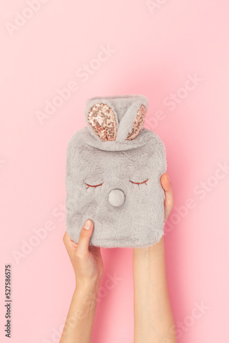 Canvas Print woman holding hot water bag