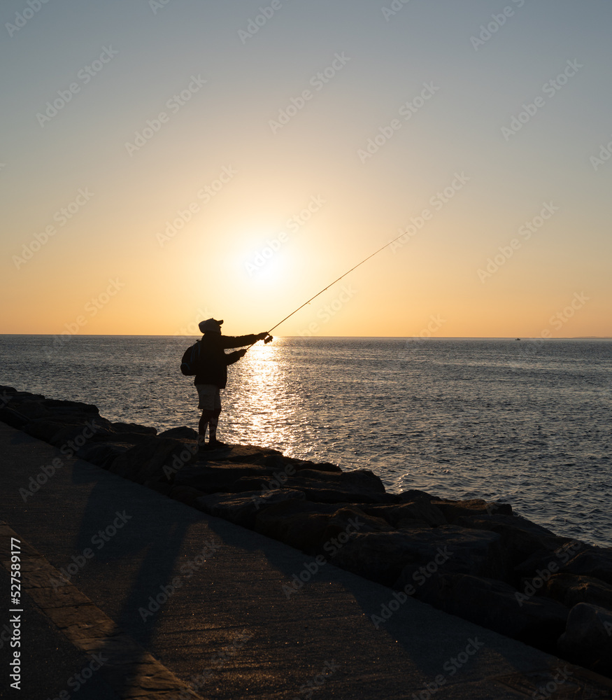 Fisherman's backlight lowers the sunset