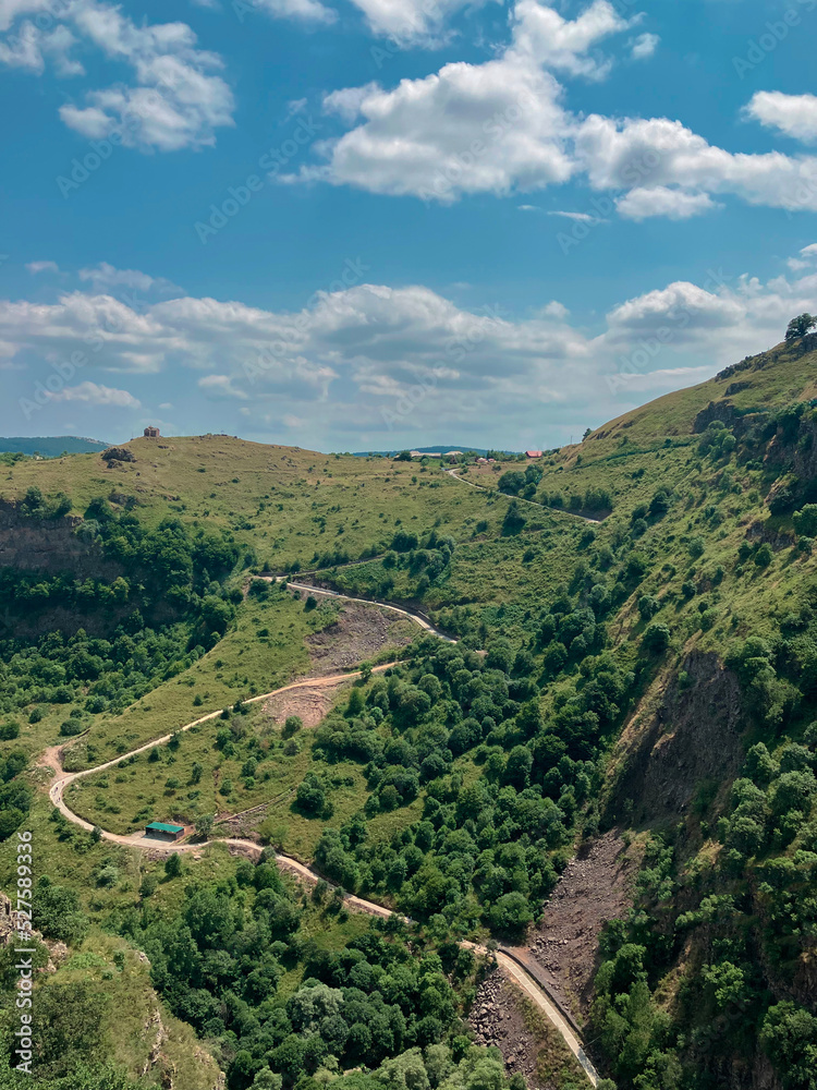 Fototapeta premium Road winds through the hills of the Tsalka, Georgia