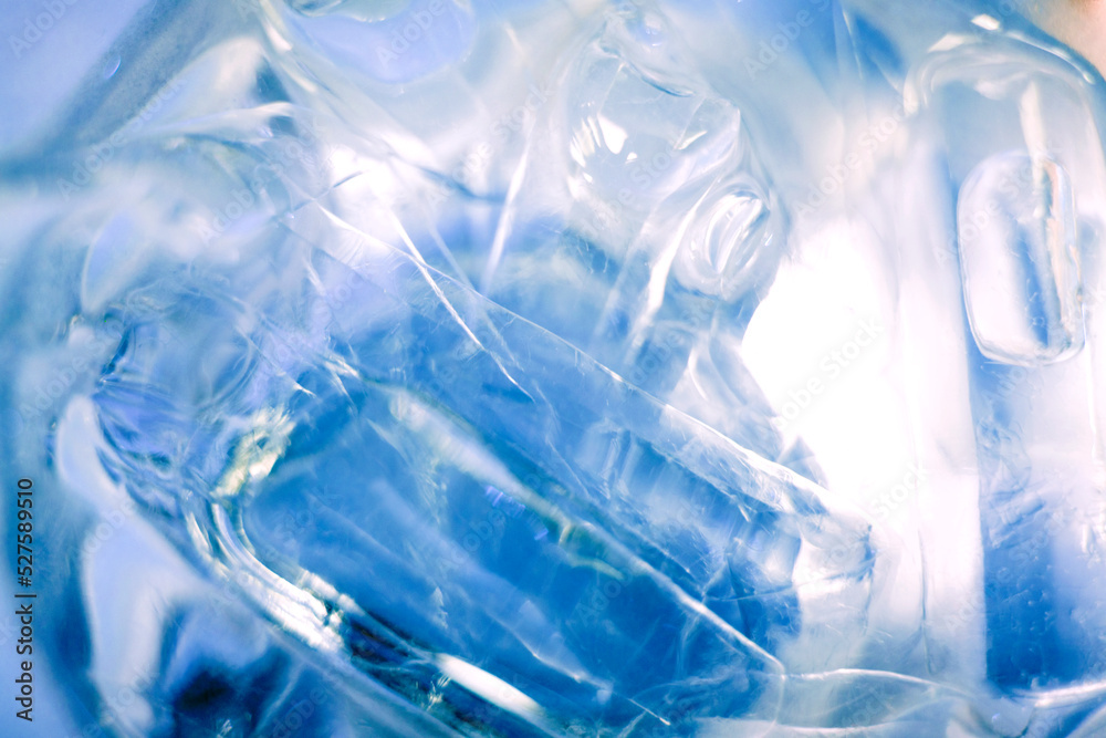 Effect blue color illustrations background Close up clear frost ice cube in glass, feeling cold