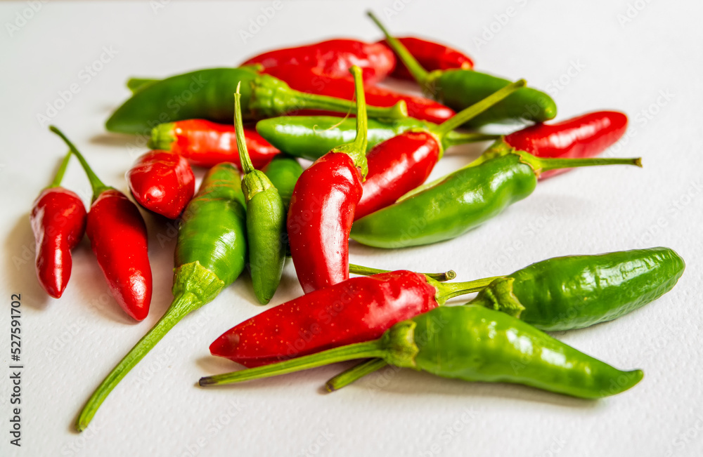Background with green and red hot peppers