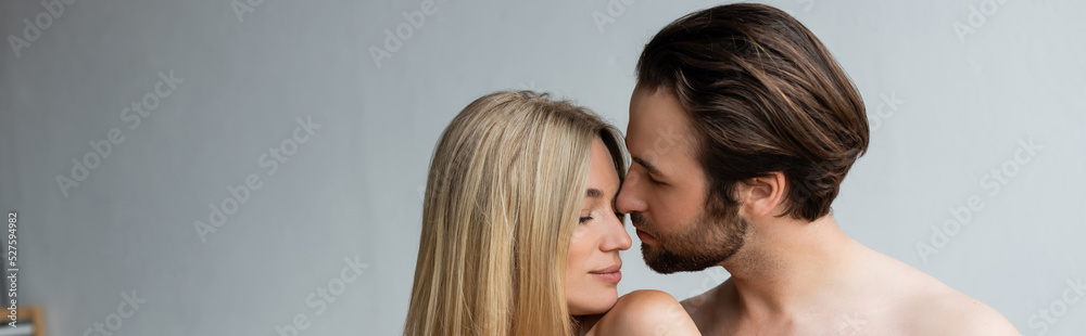 shirtless unshaven man near sexy blonde woman with closed eyes, banner. shirtless unshaven man near sexy blonde woman with closed eyes, banner.