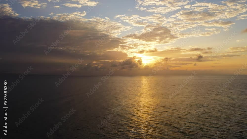 Aerial drone of Colorful bright clouds during sunset over the sea, aerial view. Sunrise over ocean. Philippines. Seascape Aerial drone of Colorful bright clouds during sunset over the sea, aerial view. Sunrise over ocean. Philippines. Seascape