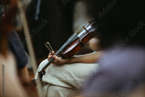 Close up musician playing violin photo