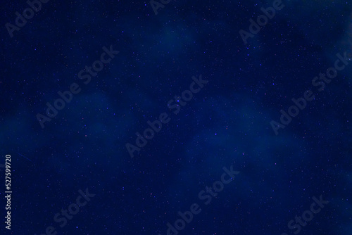 Stars on background of the night starry sky. Milky Way, galaxies and universes on a dark blue background © alexkoral