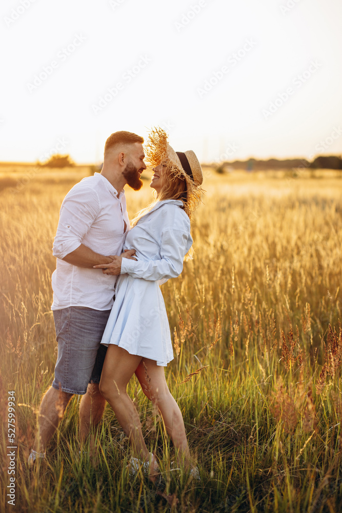 Couple in love together in the field Couple in love together in the field