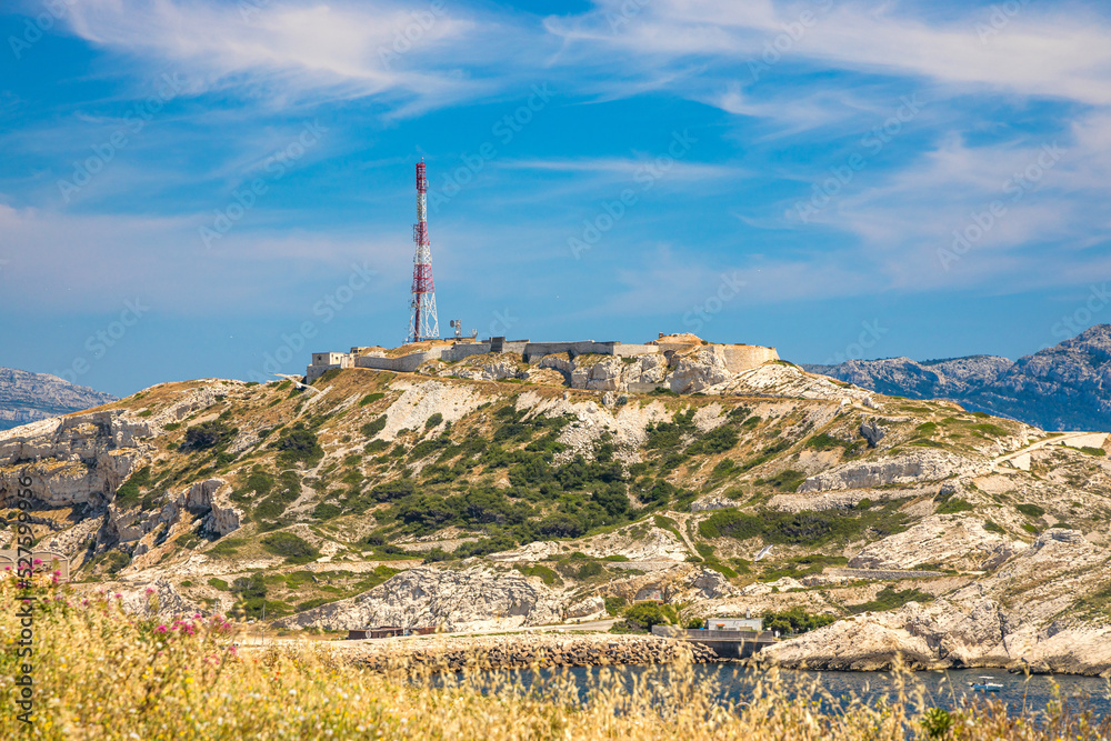 Communication tower and Fort de Pomègues on the Frioul archipelago off the coast of Marseille