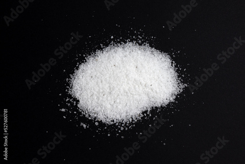 pile of salt isolated on black background