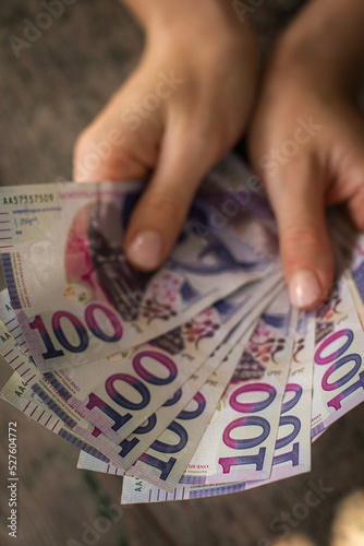 Hands holding georgian lari bills. Bunch of banknotes of Georgia money