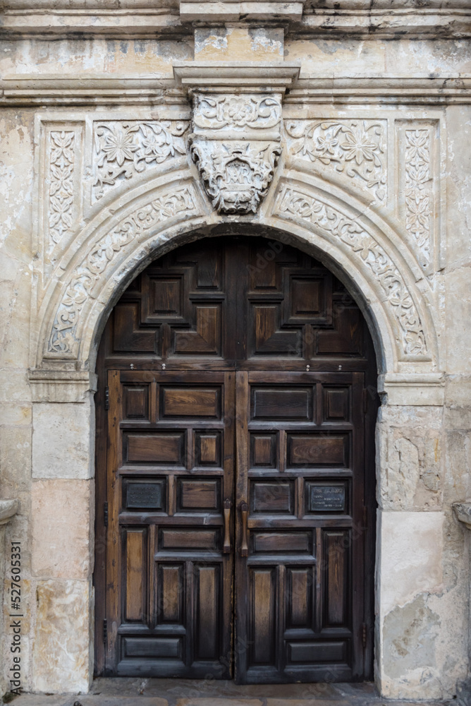 Beautiful Wood Door surrounded by Stone