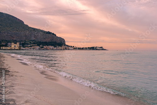 Fototapeta Naklejka Na Ścianę i Meble -  Sunset landscape on a beautiful beach in Mondello, Palermo, Italy.