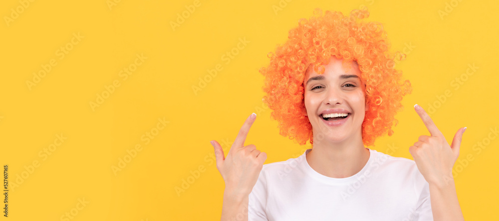 Party fun wig. Woman isolated face portrait, banner with copy space. girls birthday party. happy funny woman in curly wig. express positive emotions. Party fun wig. Woman isolated face portrait, banner with copy space. girls birthday party. happy funny woman in curly wig. express positive emotions.