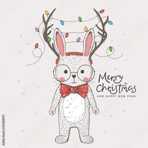 Cute rabbit with deer horns, christmas garland, bow tie. Christmas card. New Year. Season's Greetings