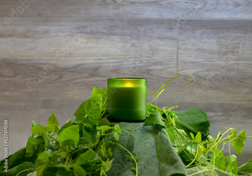 Canvas Print object photo of a candle on a wooden wall background, a candle stands on a bed o