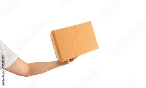 Delivery man hand holding parcel cardboard box on transparent background - PNG format. © banphote