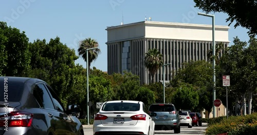 Afternoon palm framed view of the downtown skyline of West Covina, California, USA. photo