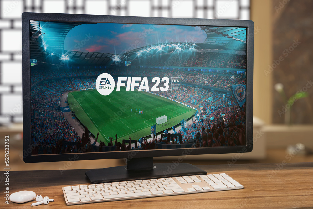 Ultimate Fifa 23 game on computer screen. Monitor, keyboard and airpods on  wooden table. Selective focus. Rio de Janeiro, RJ, Brazil. September 2022  Stock Photo | Adobe Stock
