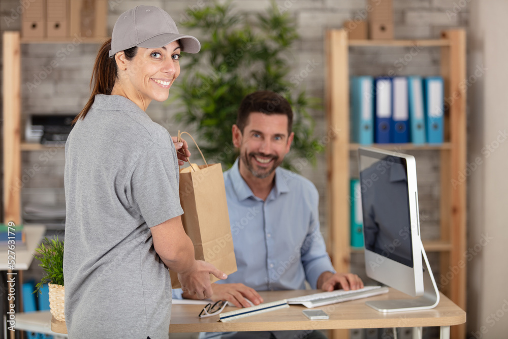 courier delivering fresh lunch businessman in office courier delivering fresh lunch businessman in office