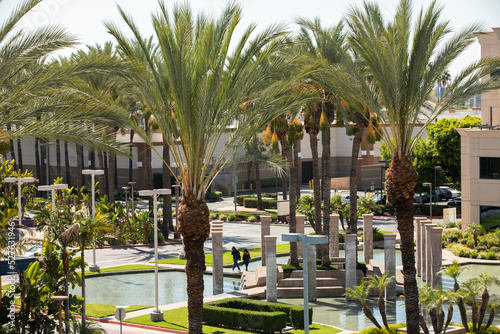 Afternoon palm framed view of the downtown skyline of West Covina, California, USA. photo