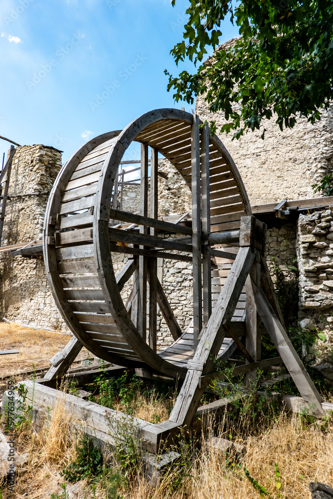 A wheeled wooden elevator serving as an aid in the reconstruction of Vinne Castle in Slovakia A wheeled wooden elevator serving as an aid in the reconstruction of Vinne Castle in Slovakia