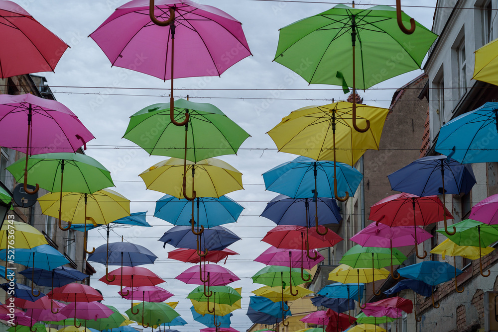 CITYSCAPE - Colorful umbrellas above the promenade in the city center