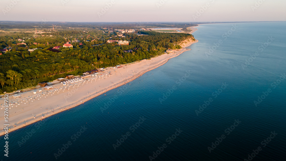 top view of the village of Yantarny in the Kaliningrad region, the Baltic Sea and the beach