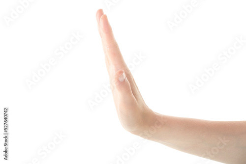 Female Hand is Making Stop Gesture Against Isolated White Background