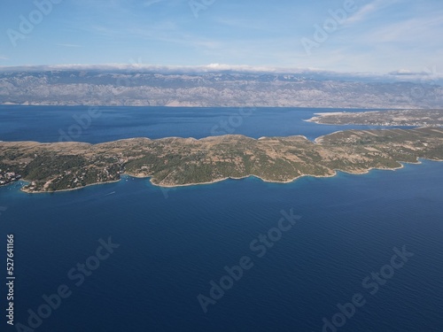 Aerial view of Potocnica, Lun and Novalja in island of Pag, archipelago of Croatia. Panoramic drone view of waterfront, idyllic and turquoise sea in Novalja, Adriatic Sea in Dalmatia region. 