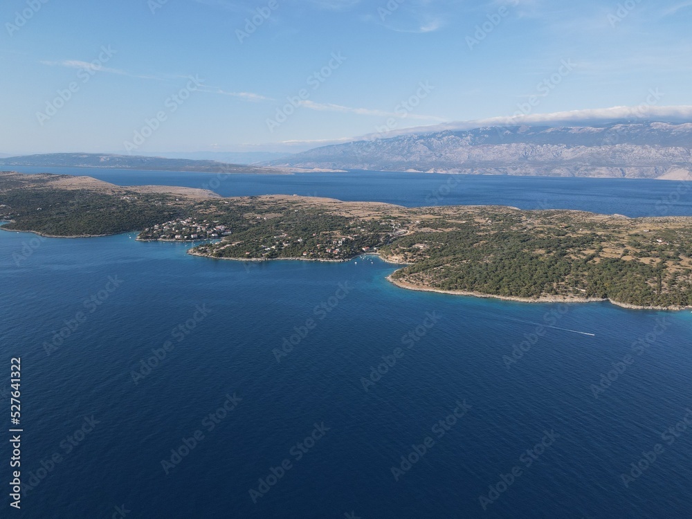 Naklejka premium Aerial view of Potocnica, Lun and Novalja in island of Pag, archipelago of Croatia. Panoramic drone view of waterfront, idyllic and turquoise sea in Novalja, Adriatic Sea in Dalmatia region.