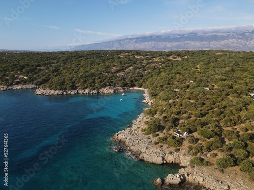 Aerial view of Potocnica, Lun and Novalja in island of Pag, archipelago of Croatia. Panoramic drone view of waterfront, idyllic and turquoise sea in Novalja, Adriatic Sea in Dalmatia region. 