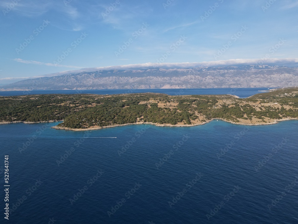 Aerial view of Potocnica, Lun and Novalja in island of Pag, archipelago of Croatia. Panoramic drone view of waterfront, idyllic and turquoise sea in Novalja, Adriatic Sea in Dalmatia region.
