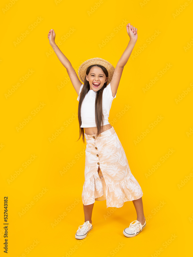 cheerful teen girl in straw hat having fun on yellow background cheerful teen girl in straw hat having fun on yellow background