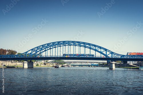 Marshal Piłsudski Bridge. Blue steel construction on the Vistula river. Cracow, Poland